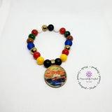 Multicolored Beaded Bracelet with a Fabric Charm. - Purposefully Crafted By Koko